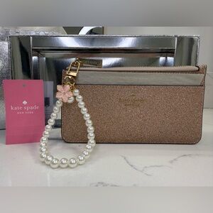 kate spade Rose Gold Glitter Wristlet Clutch with Pearl Charm New in Box